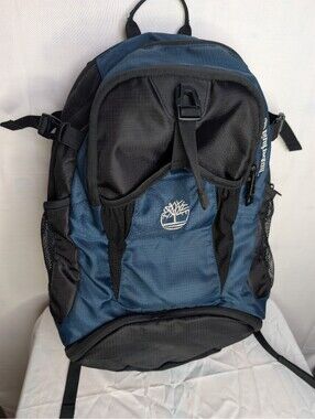 Timberland Blue and Black Backpack with Multiple Compartments